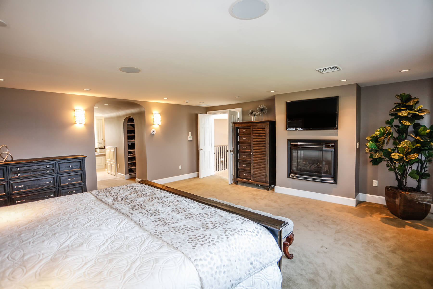 master bedroom w fireplace and tv 2
